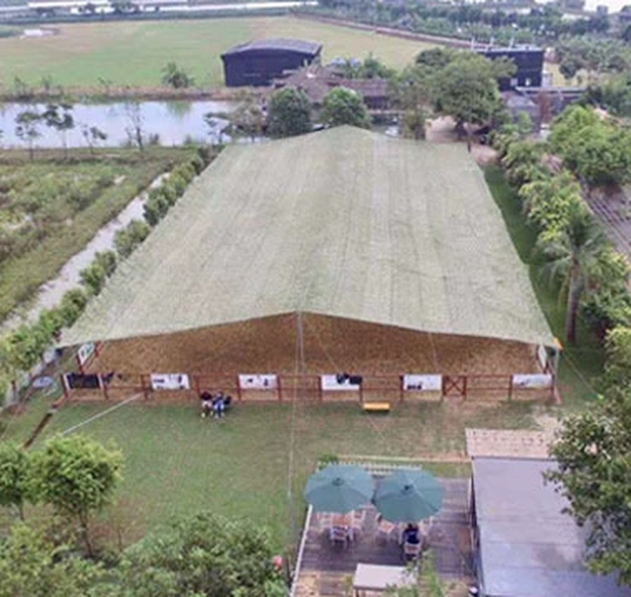 Camouflage net used as courtyard and lawn shade