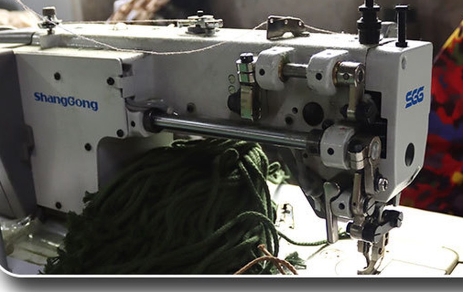 Industrial sewing line stitching camouflage netting